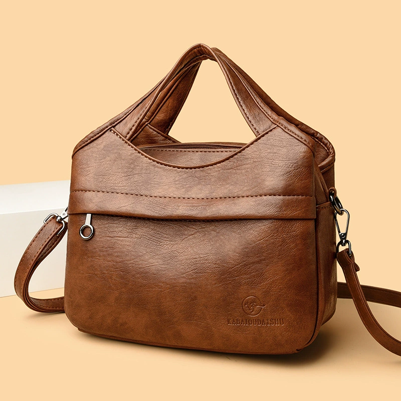 レディース レトロ ショルダーバッグ: 柔らかいレザー、大容量、多用途で実用的。